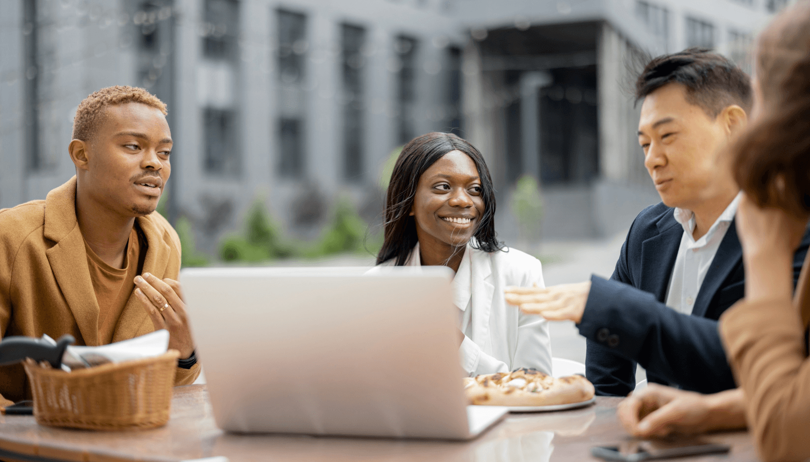 Coworking space members at the table